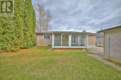 Back of home with sunroom - 25 Rice Road, Welland (N. Welland), ON - Outdoor