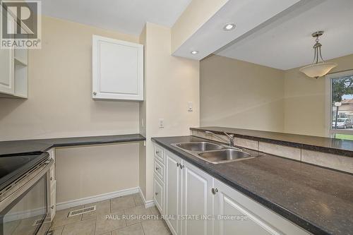Kitchen - 22 - 2570 Southvale Crescent, Ottawa, ON - Indoor Photo Showing Kitchen With Double Sink