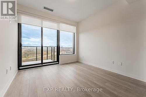 Ph1210 - 3006 William Cutmore Boulevard, Oakville, ON - Indoor Photo Showing Other Room