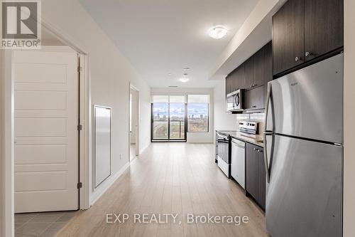 Ph1210 - 3006 William Cutmore Boulevard, Oakville, ON - Indoor Photo Showing Kitchen With Stainless Steel Kitchen