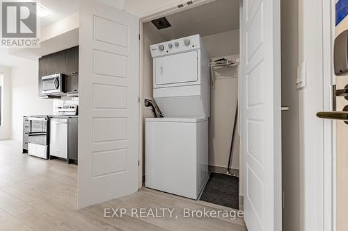 Ph1210 - 3006 William Cutmore Boulevard, Oakville, ON - Indoor Photo Showing Laundry Room