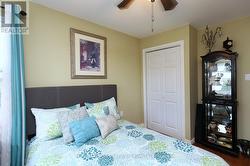 Main floor bdrm & Walk-In Closet - 