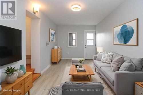 Virtually Staged - 677 Orpington Road, Peterborough (Otonabee Ward 1), ON - Indoor Photo Showing Living Room