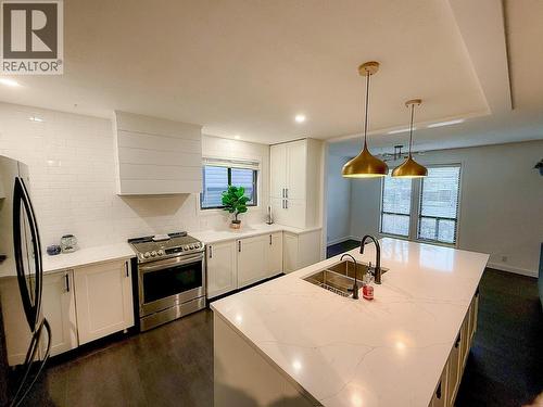10728 18 Street, Dawson Creek, BC - Indoor Photo Showing Kitchen With Double Sink With Upgraded Kitchen