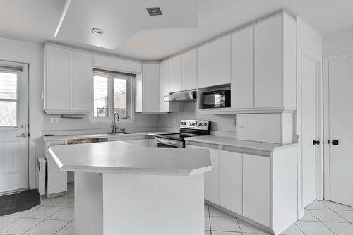 Kitchen - 1671  - 1675 Rue Pépin, Québec (Les Rivières), QC - Indoor Photo Showing Kitchen With Double Sink