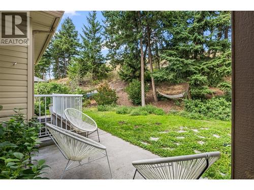 Private backyard backing onto nature - 1474 Rose Meadow Drive, West Kelowna, BC - Outdoor With Deck Patio Veranda