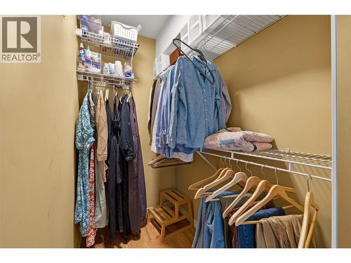 Primary walk-in closet - 1474 Rose Meadow Drive, West Kelowna, BC - Indoor With Storage