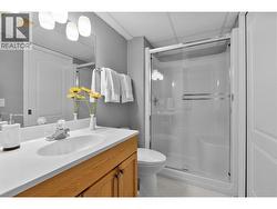 Bathroom- basement level, accessible through lower level bedroom and large storage room. - 
