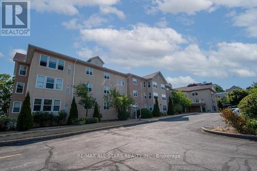 106 - 8 Huron Street, Kawartha Lakes (Lindsay), ON - Outdoor With Facade