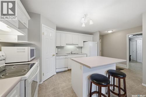 107 930 Heritage View, Saskatoon, SK - Indoor Photo Showing Kitchen With Double Sink