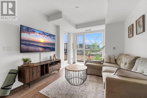 301 - 150 Sabina Drive, Oakville (Go Glenorchy), ON - Indoor Photo Showing Living Room