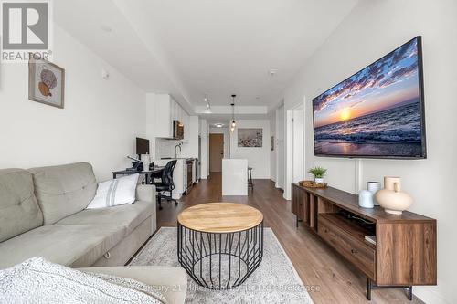 301 - 150 Sabina Drive, Oakville (Go Glenorchy), ON - Indoor Photo Showing Living Room