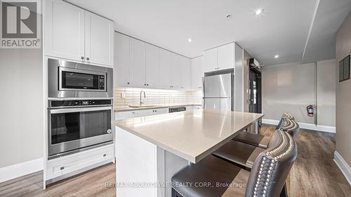 304 - 610 Farmstead Drive, Milton, ON - Indoor Photo Showing Kitchen With Stainless Steel Kitchen With Upgraded Kitchen