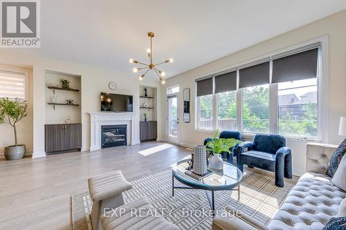 18 - 3129 Riverpath Common, Oakville, ON - Indoor Photo Showing Living Room With Fireplace