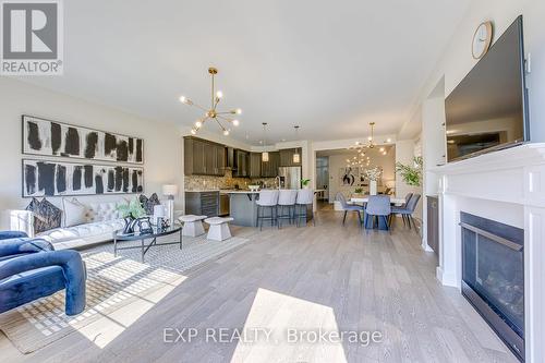 18 - 3129 Riverpath Common, Oakville, ON - Indoor Photo Showing Living Room With Fireplace