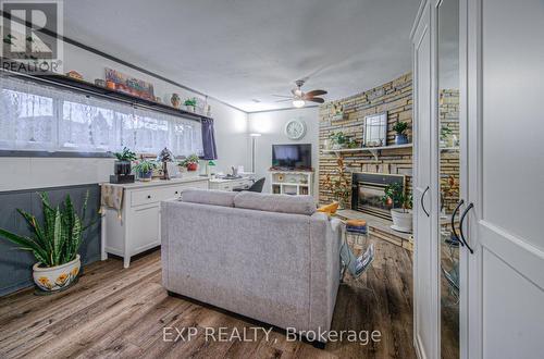 148 Strathcona Crescent, Kitchener, ON - Indoor Photo Showing Living Room With Fireplace