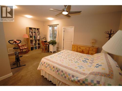 Primary Bedroom - 131 Willows Place, Oliver, BC - Indoor Photo Showing Bedroom