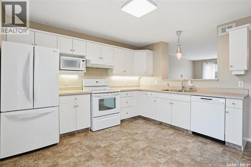 1214 14Th Avenue, Regina, SK - Indoor Photo Showing Kitchen With Double Sink