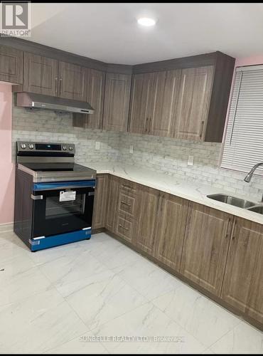 Basement - 26 Senwood Street, Brampton, ON - Indoor Photo Showing Kitchen With Double Sink