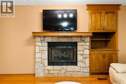 1506 Truesdale Drive E, Regina, SK - Indoor Photo Showing Living Room With Fireplace