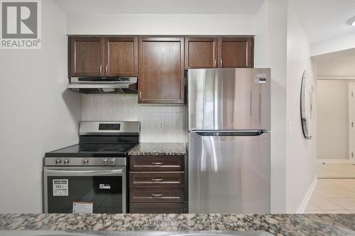 309 - 2391 Central Park Drive, Oakville, ON - Indoor Photo Showing Kitchen With Stainless Steel Kitchen