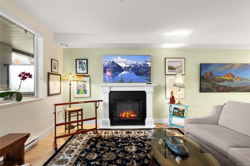 203-2461 Sidney Ave, Sidney, BC - Indoor Photo Showing Living Room With Fireplace