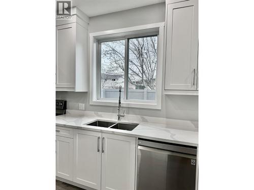 5830 Okanagan Street Unit# 102, Oliver, BC - Indoor Photo Showing Kitchen With Double Sink