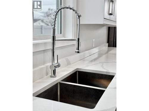 5830 Okanagan Street Unit# 102, Oliver, BC - Indoor Photo Showing Kitchen With Double Sink