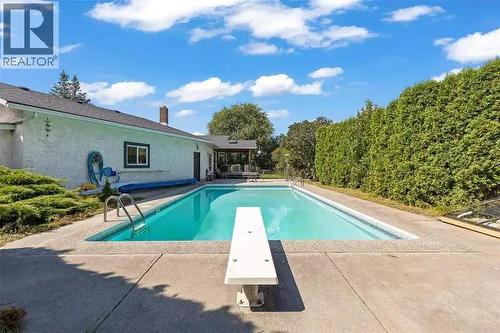 Summer Pool Photo - 420 Mugford Court, Kelowna, BC - Outdoor With In Ground Pool