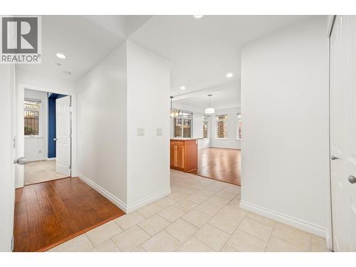 Foyer and hallway of unit from main building hallway access - 3843 Brown Road Unit# 2101, West Kelowna, BC - Indoor Photo Showing Other Room