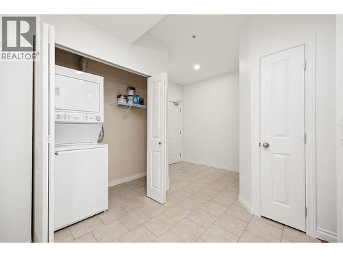 plenty of storage with 4 closets off of the foyer, one closet has ensuite washer and dryer - 3843 Brown Road Unit# 2101, West Kelowna, BC - Indoor Photo Showing Laundry Room