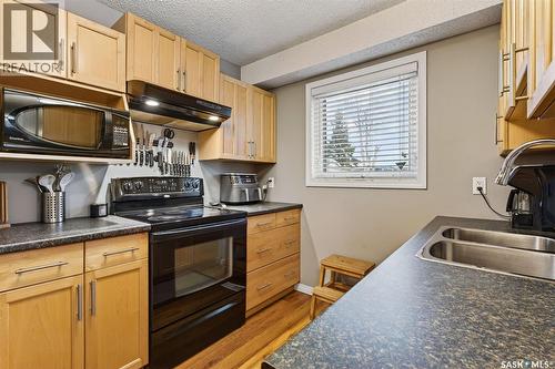 3289 Grey Owl Crescent, Prince Albert, SK - Indoor Photo Showing Kitchen With Double Sink