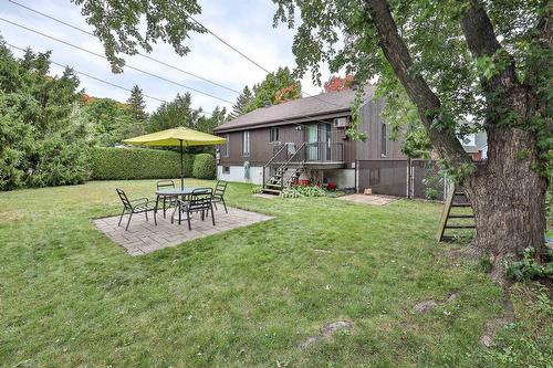 Face arrière - 77 Av. Des Camélias, Gatineau (Aylmer), QC - Outdoor With Deck Patio Veranda