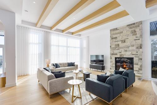 Salon - 1217 Ch. Du Millepertuis, Piedmont, QC - Indoor Photo Showing Living Room With Fireplace