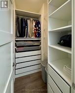 Primary walk-in closet - 