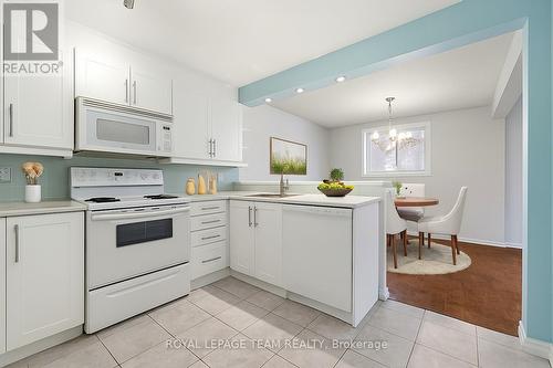 Virtually Enhanced Dining Room & Kitchen Decor - 54 - 227 Ridgepark Private, Ottawa, ON - Indoor Photo Showing Kitchen