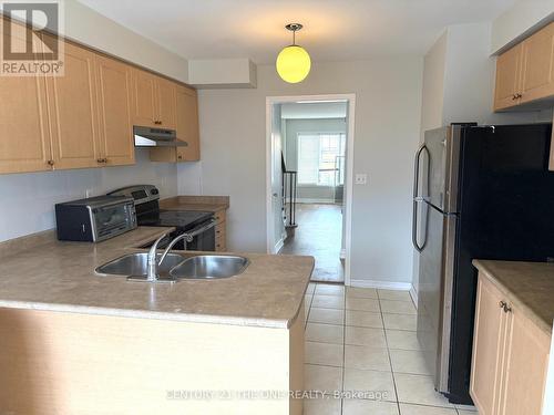 56 - 3030 Breakwater Court, Mississauga, ON - Indoor Photo Showing Kitchen With Double Sink
