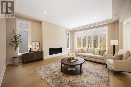 50 Carnwith Drive W, Whitby, ON - Indoor Photo Showing Living Room With Fireplace