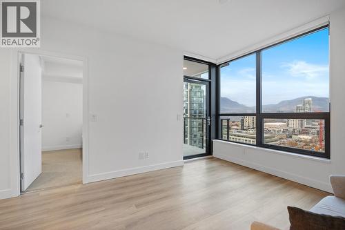 Large, double pane windows fill the space with light, making lights an optional choice! - 1488 Bertram Street Unit# 1709, Kelowna, BC - Indoor