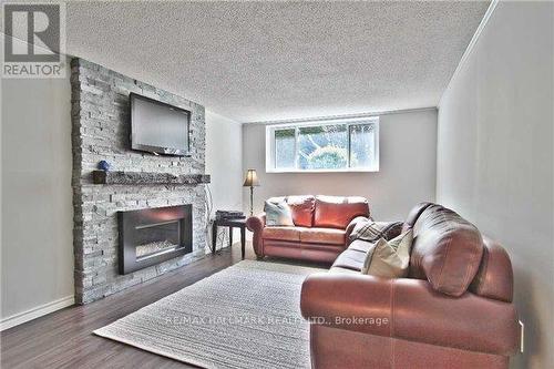 208 Pine Cove Road, Burlington, ON - Indoor Photo Showing Living Room With Fireplace