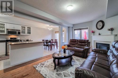 62 Lynch Crescent, Hamilton, ON - Indoor Photo Showing Living Room With Fireplace