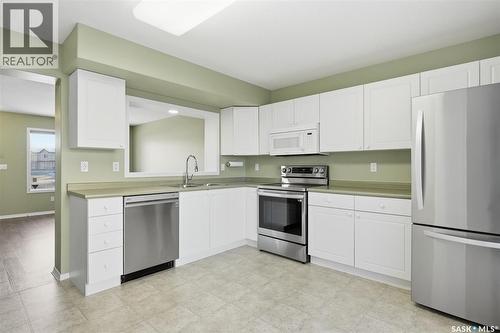 131 103 Rutherford Crescent, Saskatoon, SK - Indoor Photo Showing Kitchen With Double Sink
