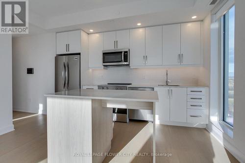 1808 - 3240 William Coltson Avenue E, Oakville, ON - Indoor Photo Showing Kitchen With Upgraded Kitchen