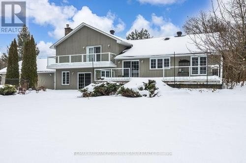 2 Mills Circle, Springwater, ON - Outdoor With Facade