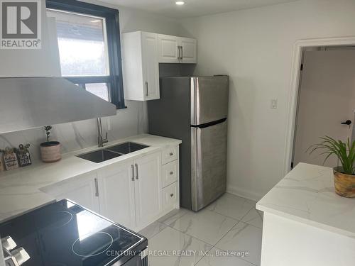 45 Fifteenth Street, Toronto, ON - Indoor Photo Showing Kitchen With Double Sink