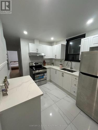 45 Fifteenth Street, Toronto, ON - Indoor Photo Showing Kitchen With Double Sink