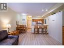 Bright open living room looking towards the kitchen and dining area - 9812 Silver Star Road Unit# 103, Vernon, BC  - Indoor Photo Showing Living Room 