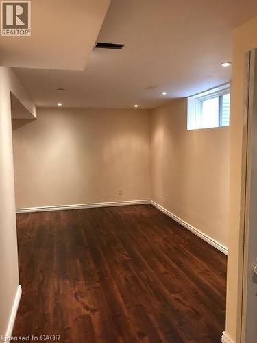 Basement with dark wood-style flooring and recessed lighting - 567 Chablis Drive, Waterloo, ON - Indoor Photo Showing Other Room