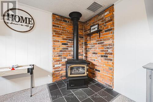 4117 Hixon Street, Lincoln, ON - Indoor Photo Showing Other Room With Fireplace