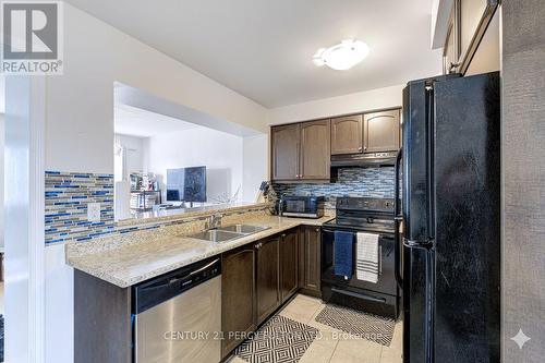 39 Vanhorne Close, Brampton, ON - Indoor Photo Showing Kitchen With Double Sink